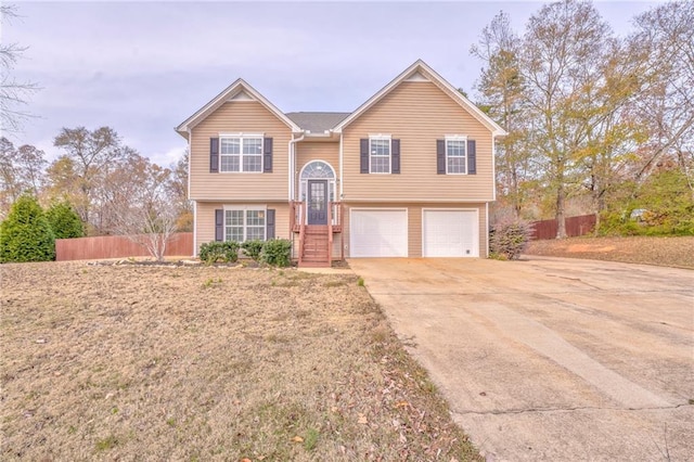 split foyer home featuring a garage