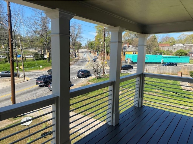 wooden terrace featuring a porch