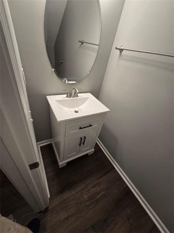 bathroom with sink and hardwood / wood-style floors