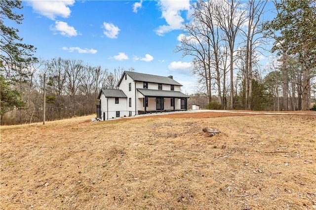 modern farmhouse featuring a porch