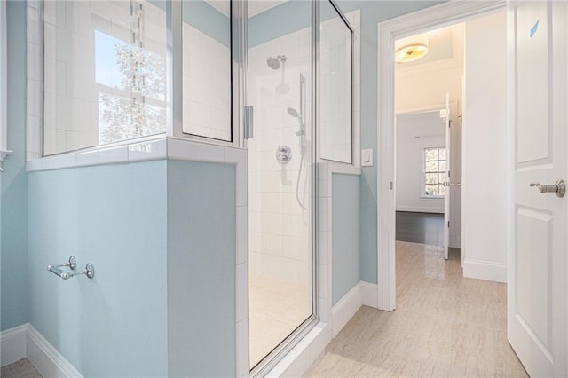 bathroom with a tile shower