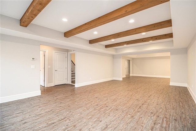 basement featuring hardwood / wood-style flooring