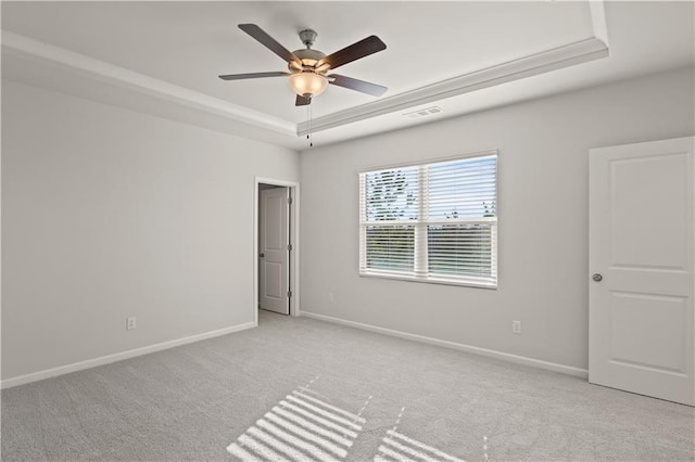 488 Village Ln, Fairburn, GA 30213 - carpeted spare room featuring a raised ceiling, a ceiling fan, and baseboards