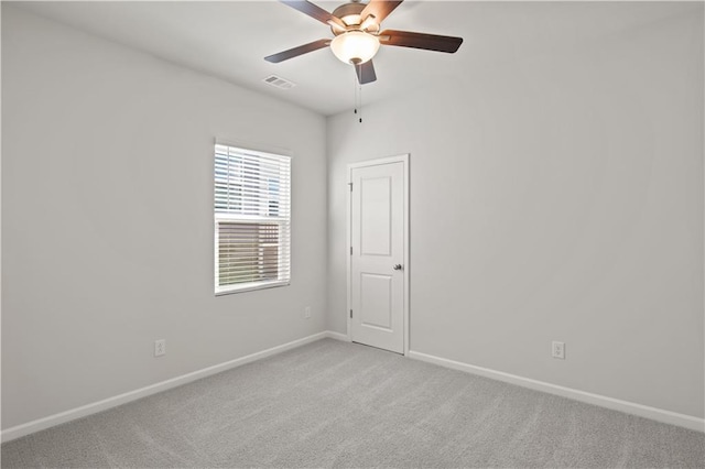 488 Village Ln, Fairburn, GA 30213 - empty room featuring baseboards, a ceiling fan, and light colored carpet
