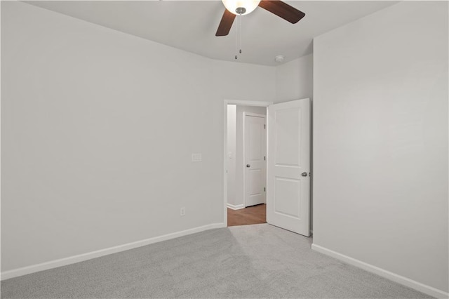 488 Village Ln, Fairburn, GA 30213 - unfurnished room featuring carpet flooring, baseboards, a ceiling fan, and a smoke detector