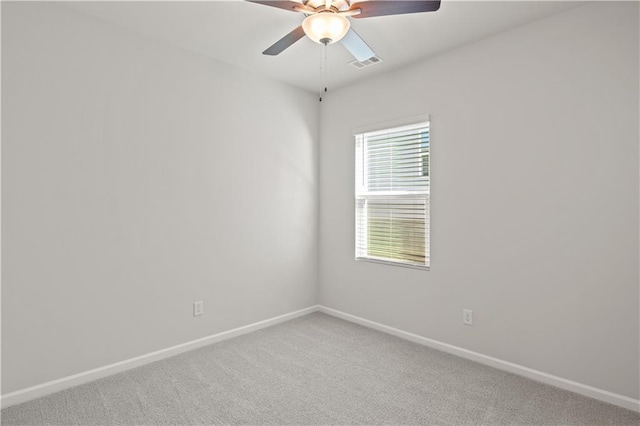 488 Village Ln, Fairburn, GA 30213 - spare room with light carpet, ceiling fan, and baseboards