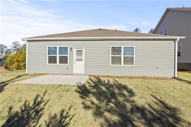 488 Village Ln, Fairburn, GA 30213 - rear view of house featuring a patio and a lawn