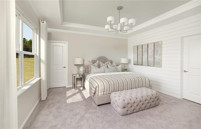 carpeted bedroom featuring crown molding, an inviting chandelier, multiple windows, and a raised ceiling