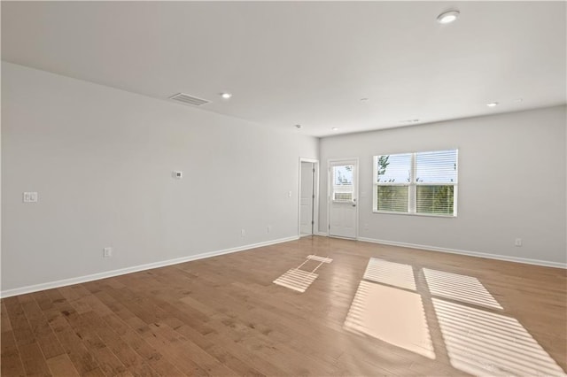 488 Village Ln, Fairburn, GA 30213 - unfurnished room featuring light wood-style flooring, baseboards, and recessed lighting