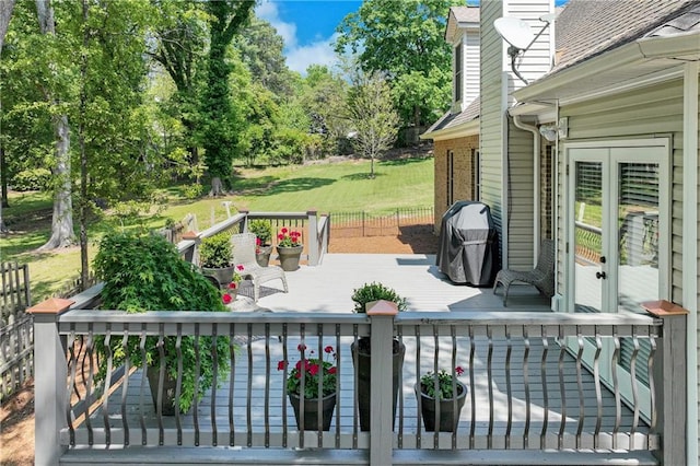 view of patio / terrace featuring a wooden deck and outdoor dining space