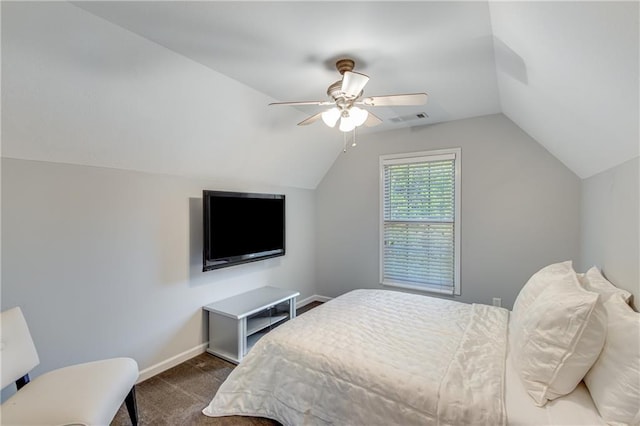 bedroom featuring lofted ceiling, dark carpet, visible vents, a ceiling fan, and baseboards