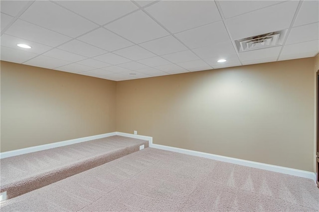 unfurnished room featuring visible vents, carpet, baseboards, a paneled ceiling, and recessed lighting