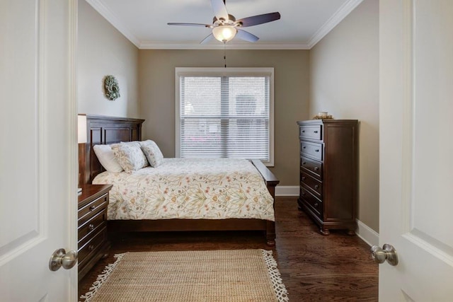 bedroom with dark hardwood / wood-style floors, ceiling fan, and crown molding