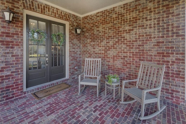 property entrance with french doors and a porch