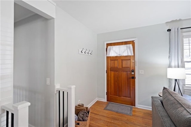 foyer entrance featuring hardwood / wood-style floors