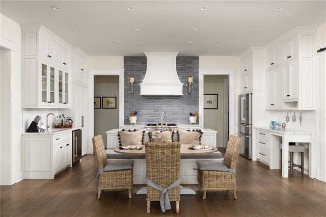 9229 Selborne Ln, Chattahoochee Hills, GA 30268 - dining area featuring wet bar, dark wood finished floors, and recessed lighting