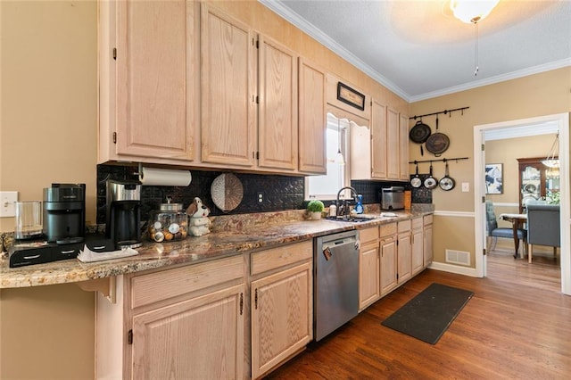 kitchen featuring visible vents, a sink, dishwasher, and light brown cabinets