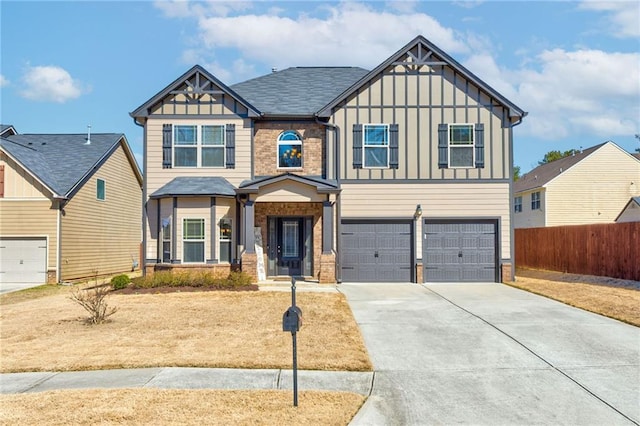 craftsman inspired home featuring driveway, an attached garage, fence, board and batten siding, and brick siding