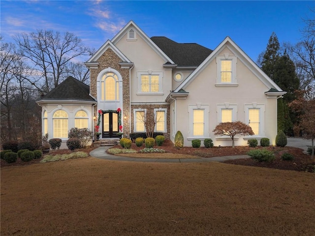 view of front property with a lawn