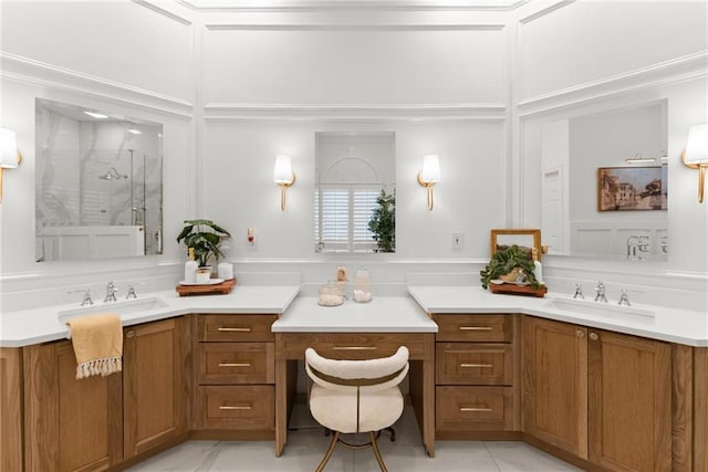 bathroom with vanity and an enclosed shower