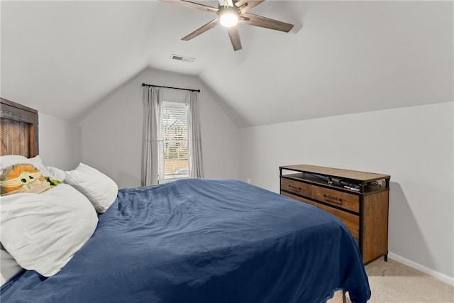 carpeted bedroom featuring ceiling fan and lofted ceiling