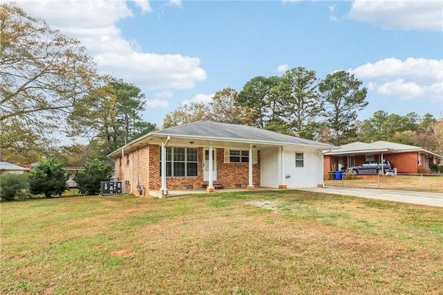 ranch-style house with a porch and a front lawn