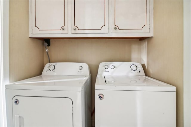 laundry room with independent washer and dryer