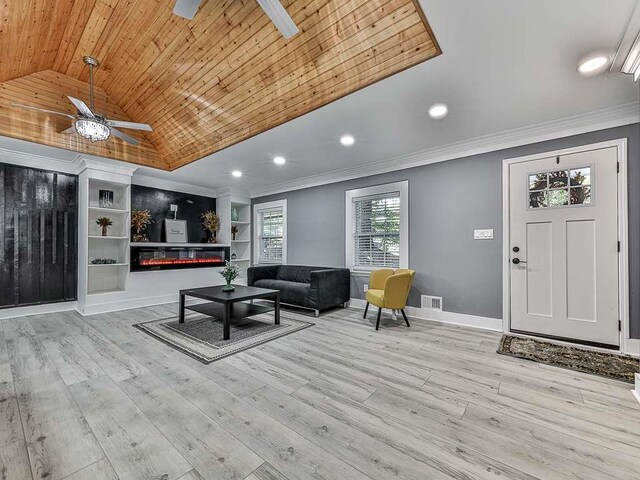 1564 Bubbling Creek Rd, Brookhaven, GA 30319 - living room with lofted ceiling, a ceiling fan, wood ceiling, and crown molding