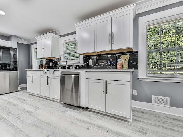 1564 Bubbling Creek Rd, Brookhaven, GA 30319 - kitchen featuring tasteful backsplash, smart refrigerator, visible vents, and white cabinets