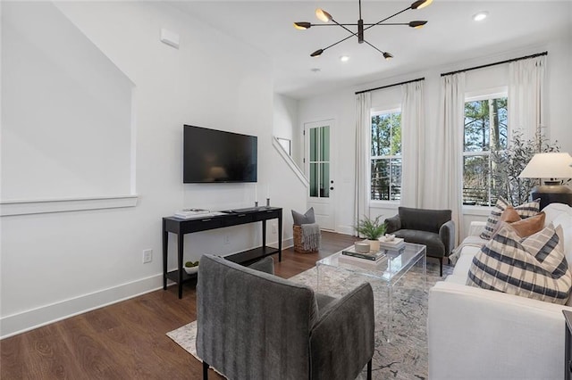 1427 Hazy Way Unit 310, Atlanta, GA 30315 - living room with wood finished floors, a chandelier, baseboards, stairs, and recessed lighting