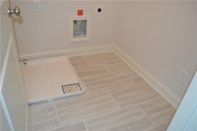 laundry area with electric dryer hookup