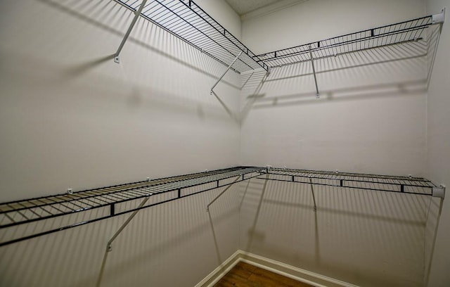 5640 Redan Cir, Stone Mountain, GA 30088 - spacious closet with dark wood-style flooring