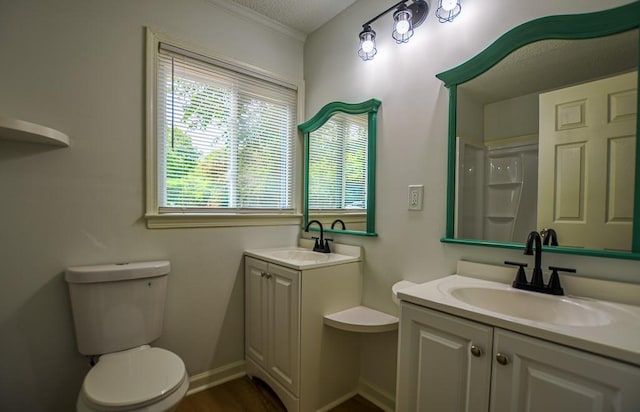 5640 Redan Cir, Stone Mountain, GA 30088 - full bath featuring vanity, toilet, ornamental molding, and baseboards