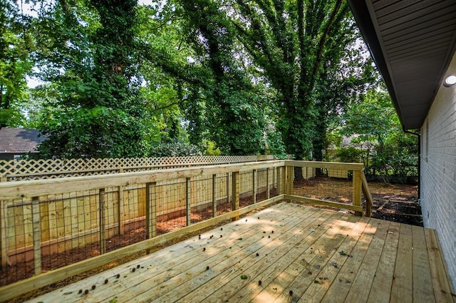 5640 Redan Cir, Stone Mountain, GA 30088 - wooden deck with a fenced backyard