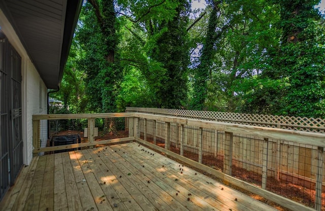 5640 Redan Cir, Stone Mountain, GA 30088 - wooden deck featuring a fenced backyard