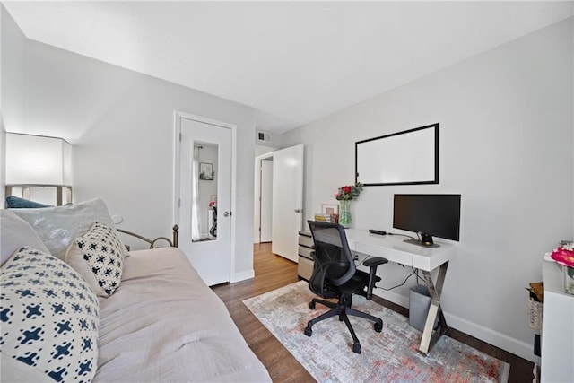 office space featuring wood-type flooring