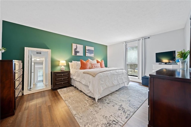 bedroom featuring hardwood / wood-style floors