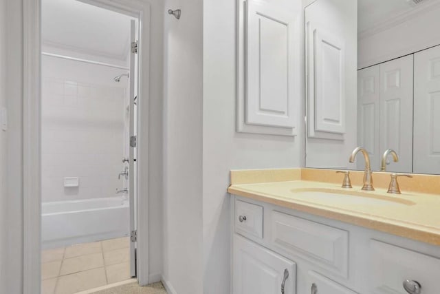 bathroom with shower / bathing tub combination, crown molding, tile patterned flooring, and vanity