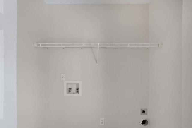 laundry area with washer hookup and hookup for an electric dryer