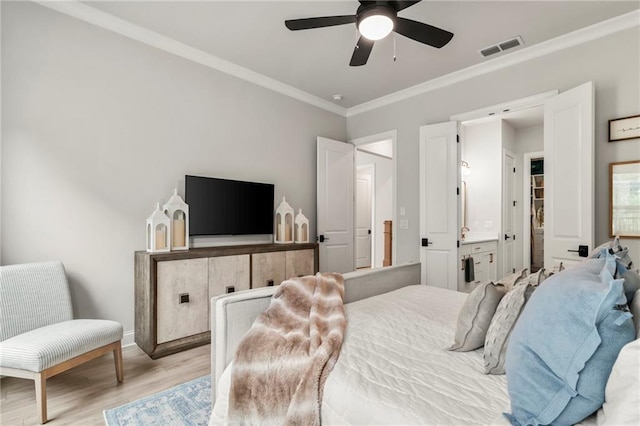 228 Idylwilde Way, Canton, GA 30115 - bedroom featuring visible vents, baseboards, a ceiling fan, crown molding, and light wood-style flooring