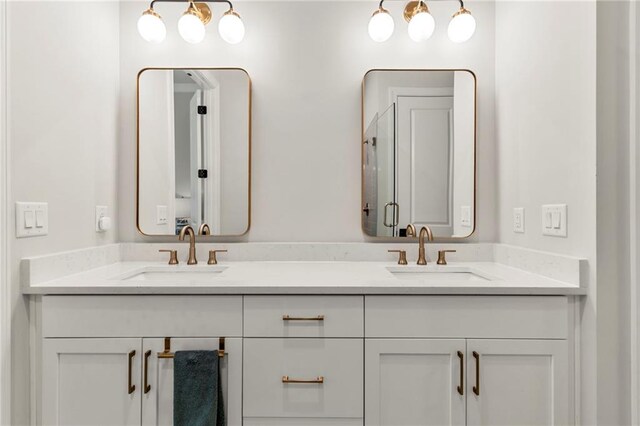 228 Idylwilde Way, Canton, GA 30115 - full bathroom featuring a sink, double vanity, and a stall shower