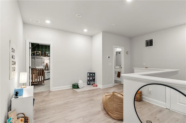 228 Idylwilde Way, Canton, GA 30115 - sitting room featuring light wood-style floors, baseboards, visible vents, and recessed lighting