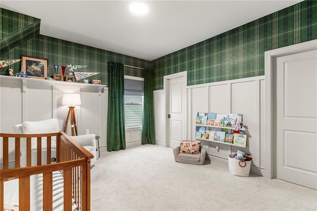 228 Idylwilde Way, Canton, GA 30115 - bedroom with wallpapered walls, a crib, carpet flooring, a wainscoted wall, and a decorative wall