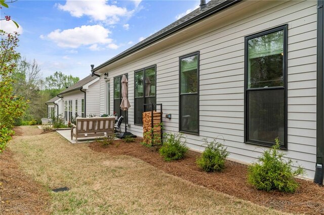 228 Idylwilde Way, Canton, GA 30115 - view of side of property with a yard