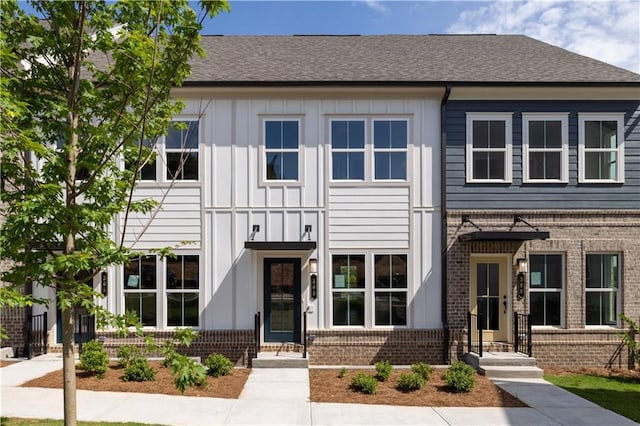 339 Skylar Way SE, Atlanta, GA 30315 - townhome / multi-family property with brick siding, board and batten siding, and a shingled roof