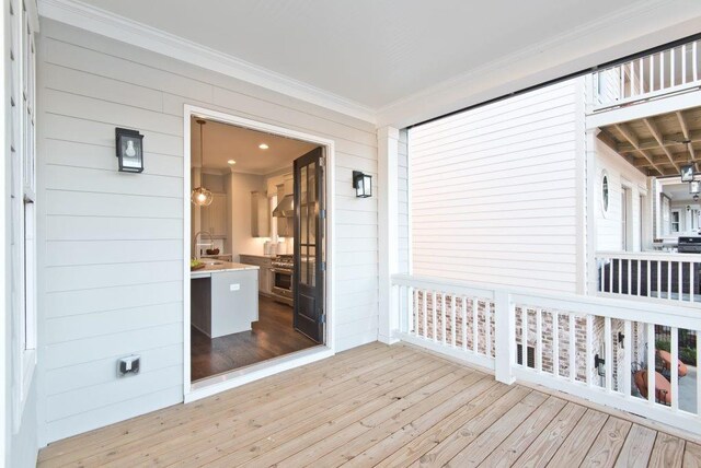 wooden terrace featuring sink