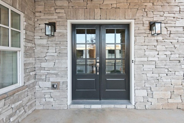 property entrance featuring french doors