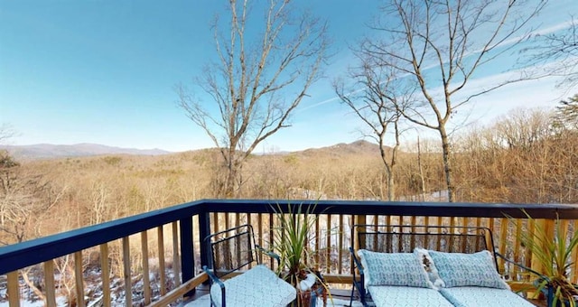 balcony featuring a mountain view