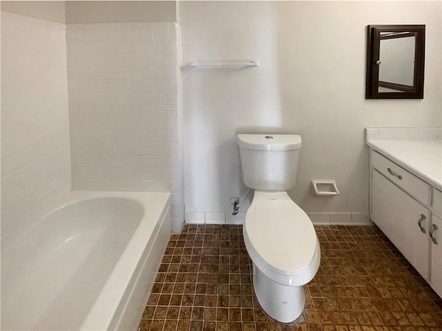 full bathroom with vanity, toilet, and tiled shower / bath combo