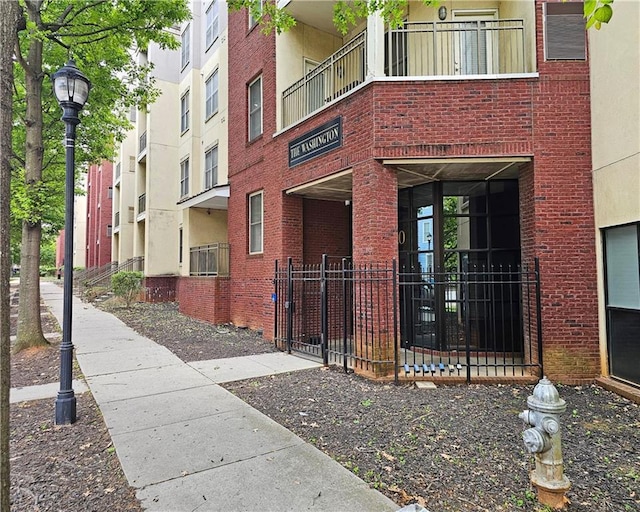view of property featuring fence
